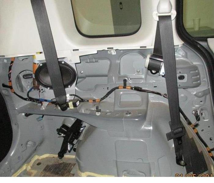 interior of a car with the metal frame exposed