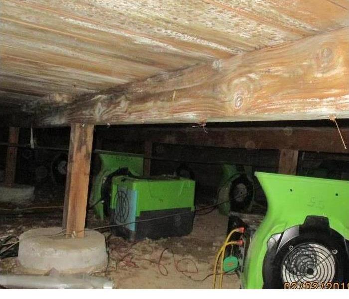 crawlspace with clean wood subfloor