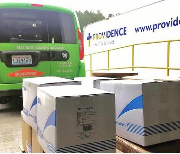 SERVPRO van with boxes of PPE being donated to local hospital