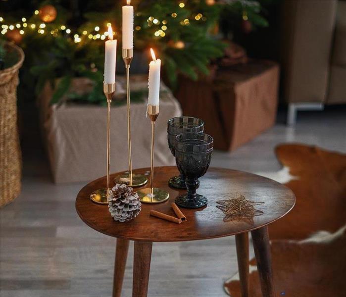 table with Christmas decorations and candles
